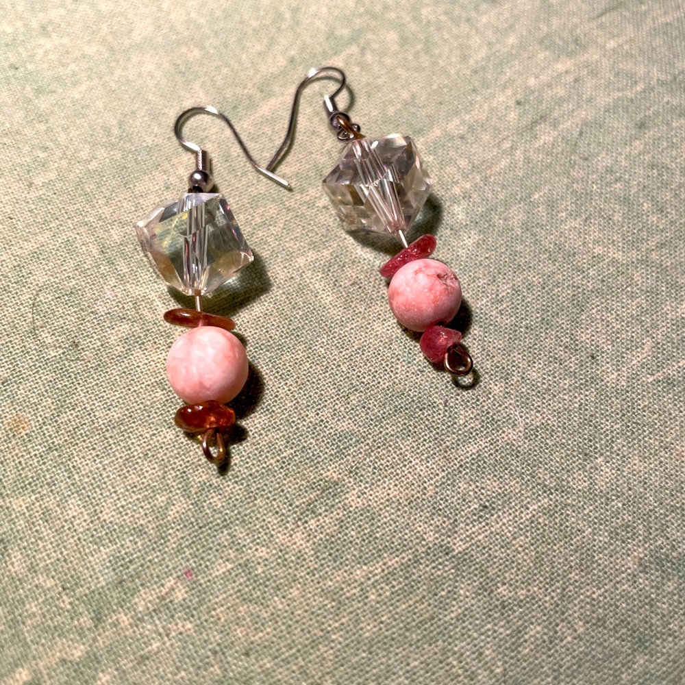 Crystal with a touch of pink. Very delicate.